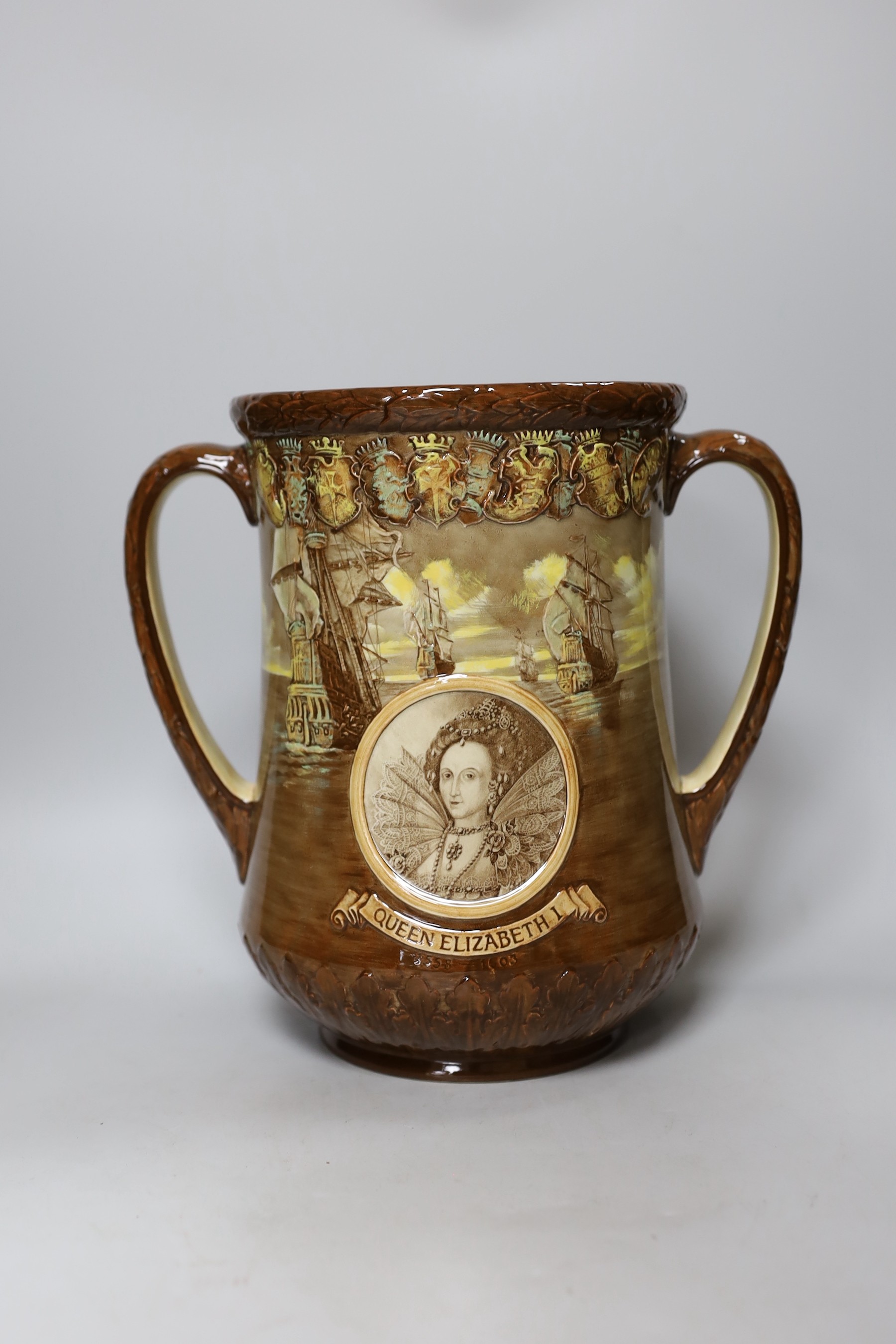 A Royal Doulton loving cup, Elizabeth II Coronation June 1953, 554 of 1000 with certificate signed by Art Director, Cecil J Noke, 27cms high